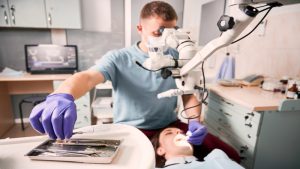What is the difference between periodontics and prosthodontics?